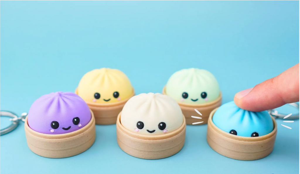 Bao bun clicker keychains in pastel colors